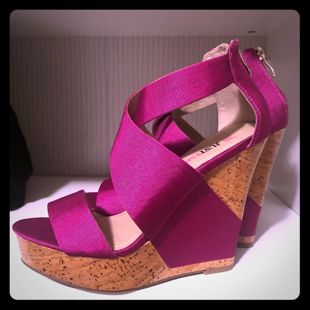 Fuchsia pink wedge shoes.